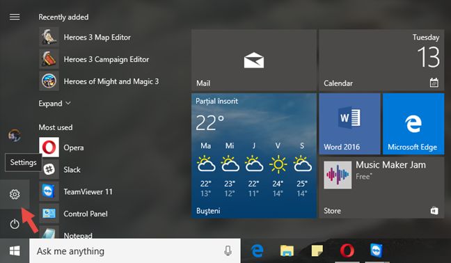 The Start Menu is displayed, with an arrow pointing to the Settings menu item.